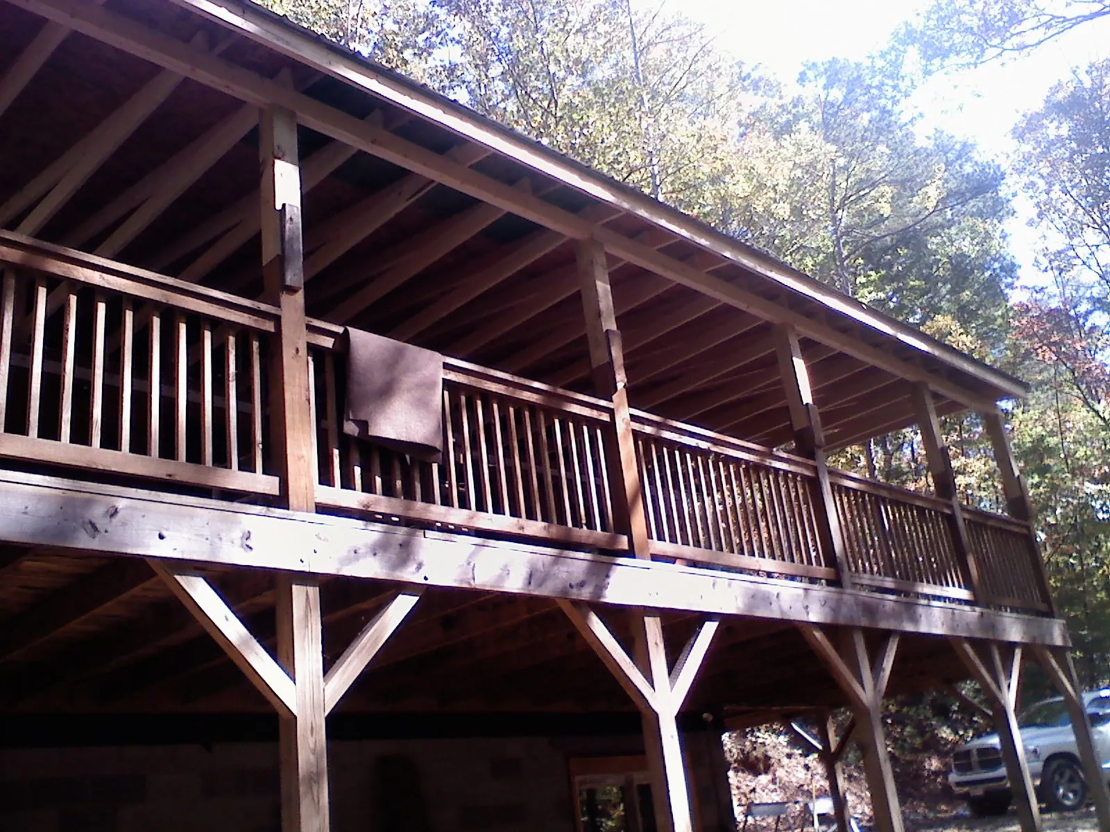 Timber framing under a new elevated porch and deck — Roof Leak Repair in Gulf Breeze by Roofing Brothers